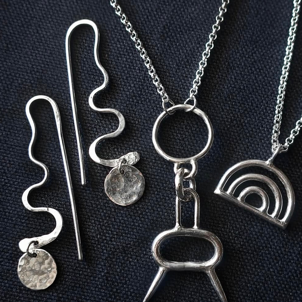 Fair-mined little vipers dangling earrings.