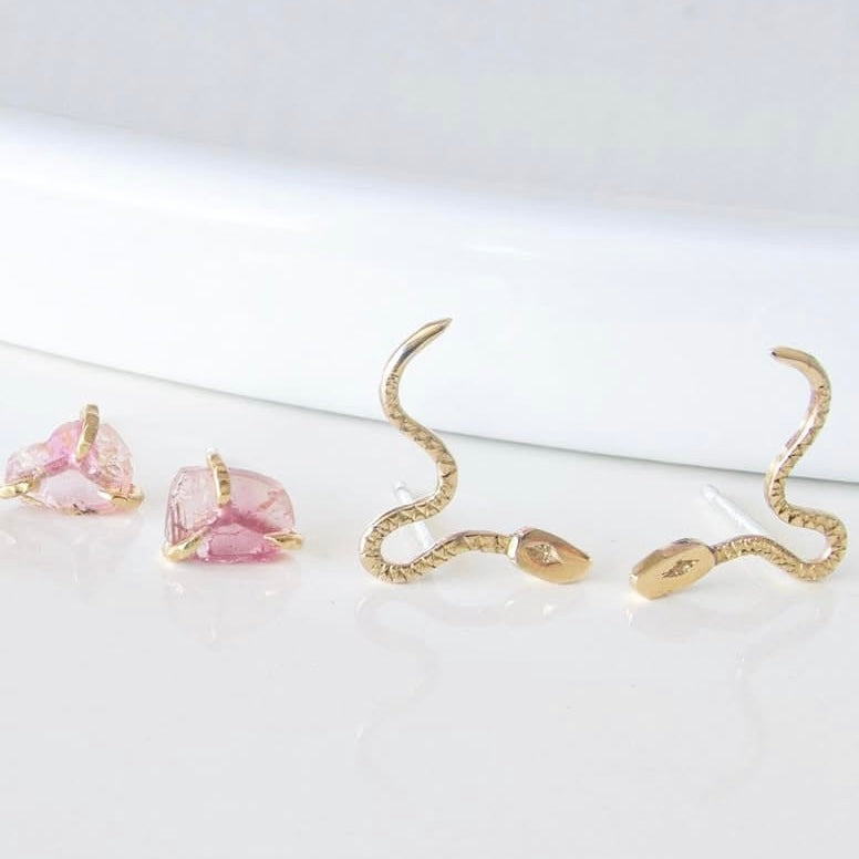 10K Gold snake-shaped earrings Made with recycled metals.
