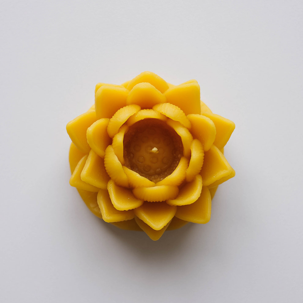 Lotus flower beeswax candle.