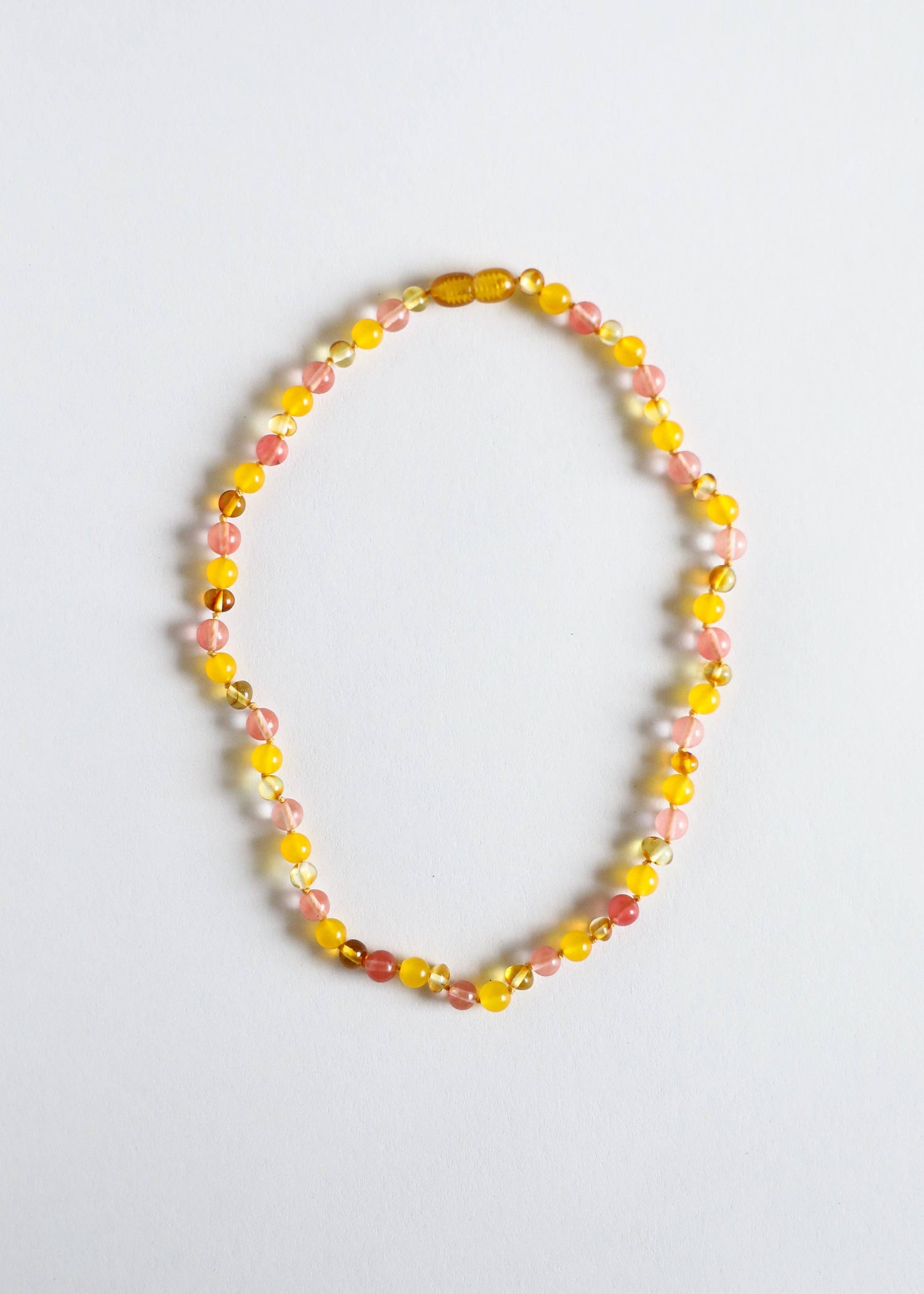 Polished Baltic amber child necklace.