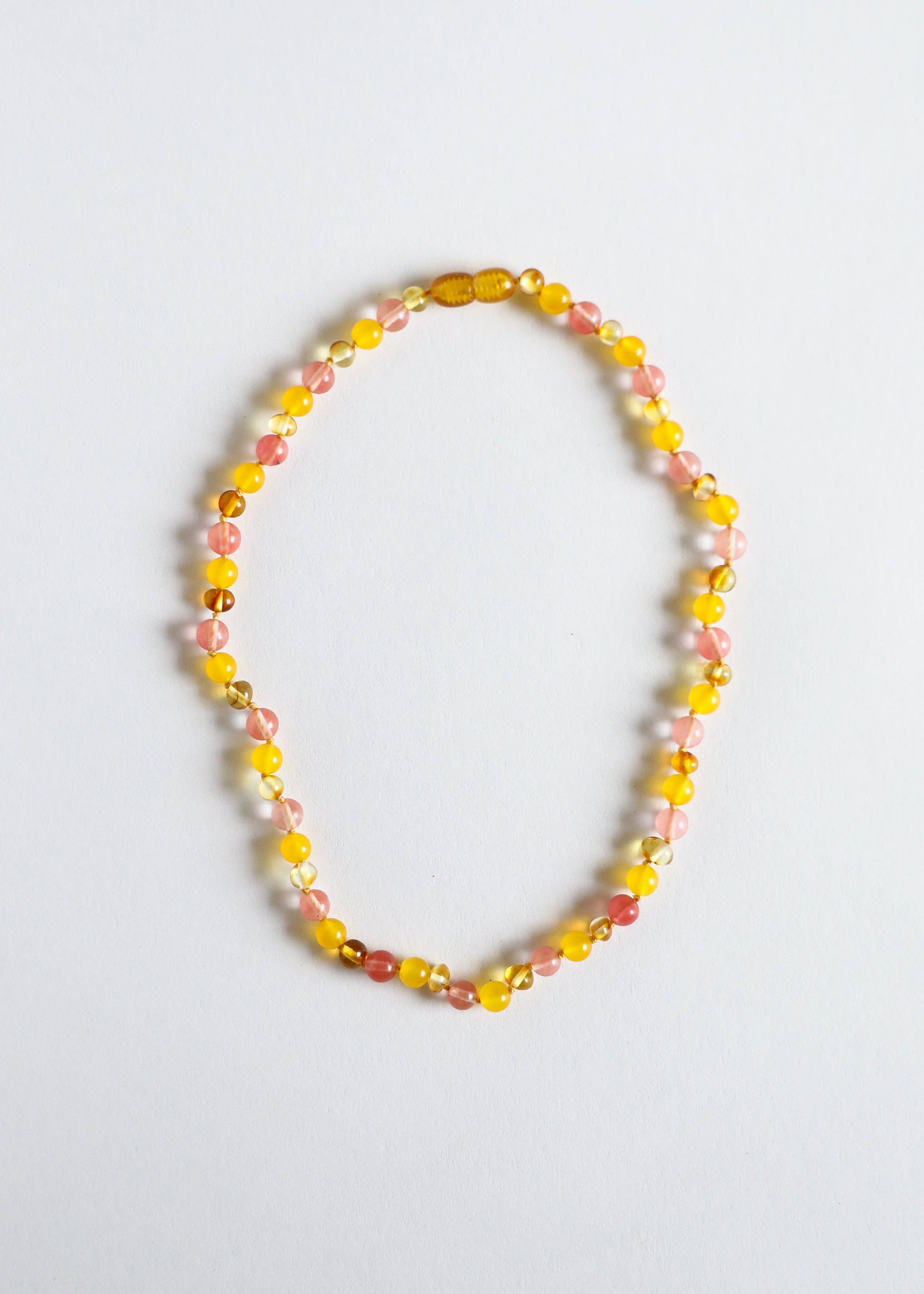 Polished Baltic amber child necklace.