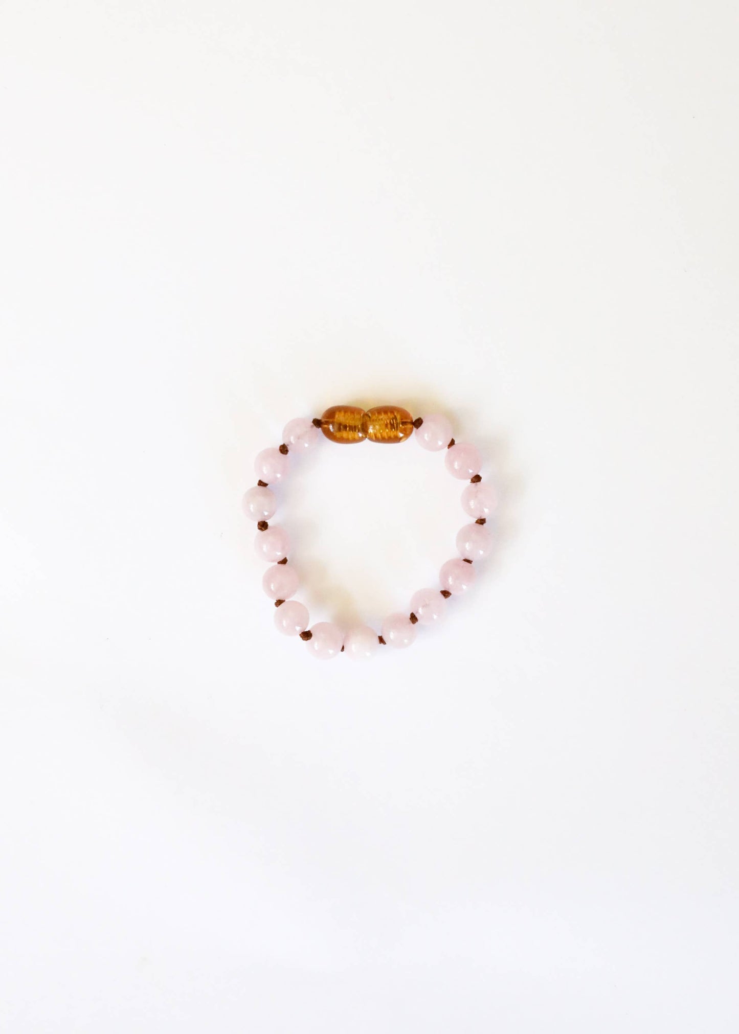 Child's gemstone rose quartz bracelet.