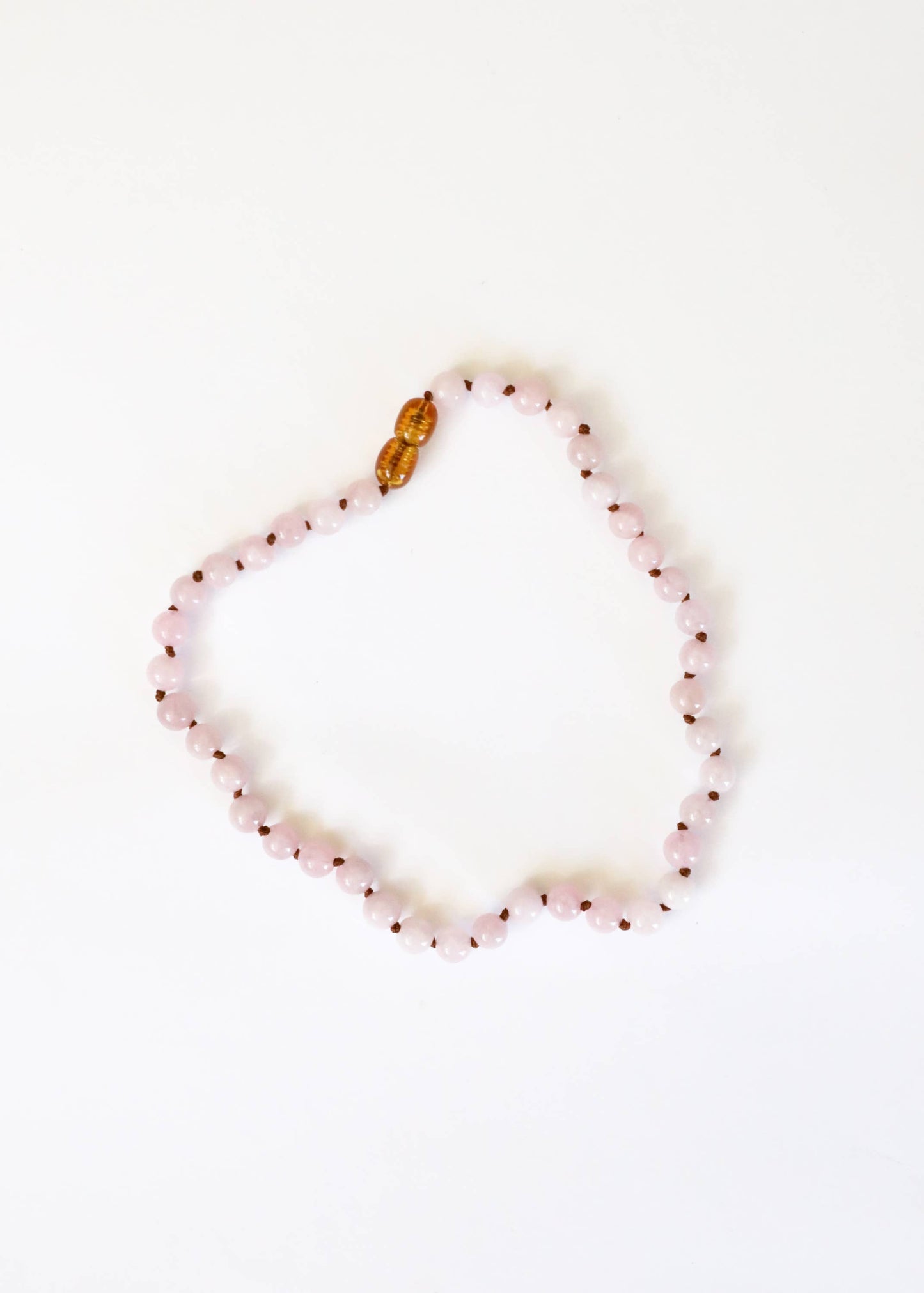 Pure Gemstone rose quartz child necklace.