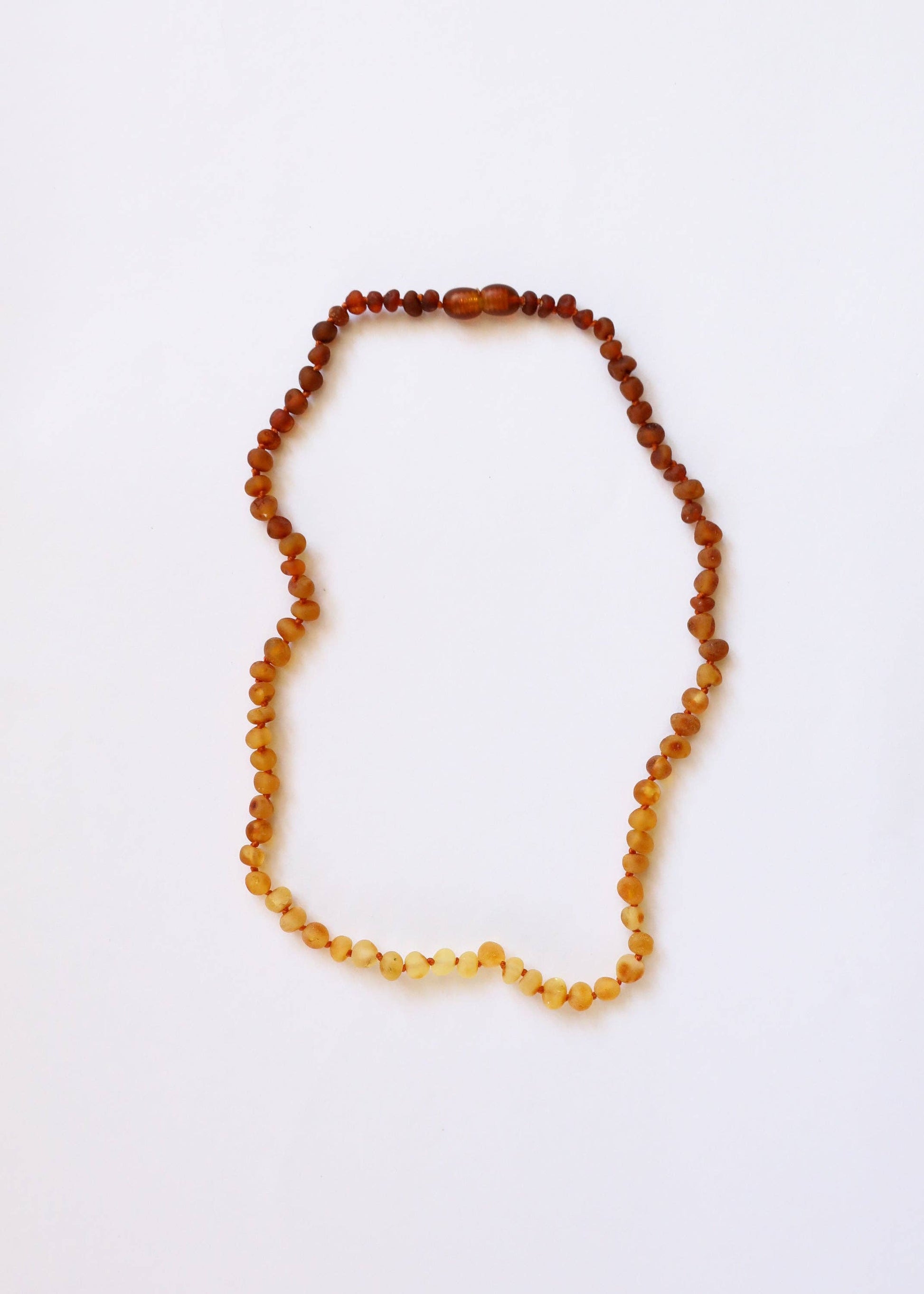 A raw amber beaded baby necklace.