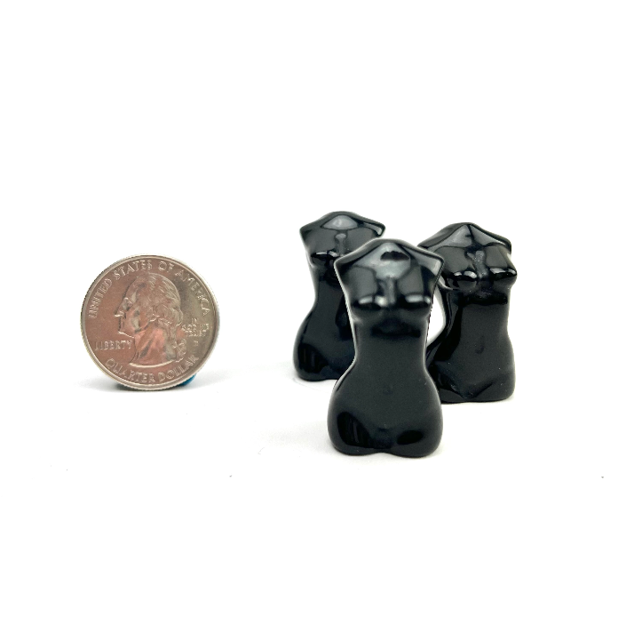 Female form black obsidian stone.