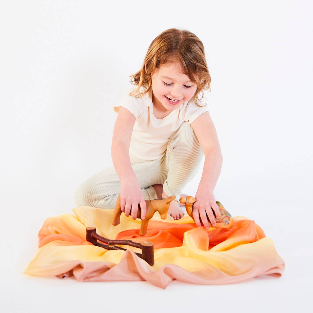 Naturally dyed play silks.