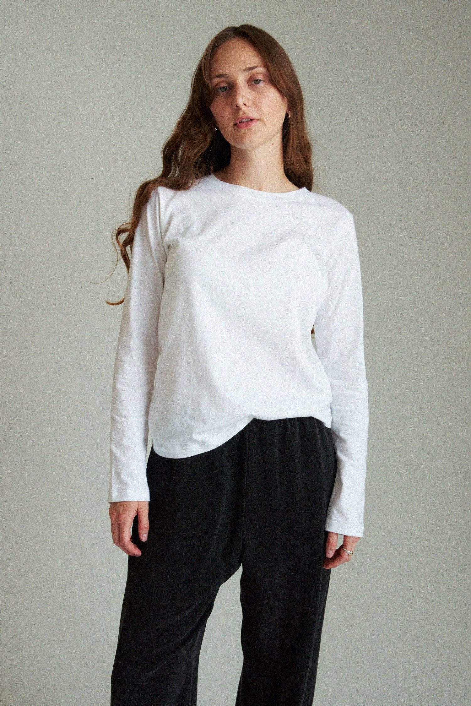 A white organic cotton long sleeve tee.