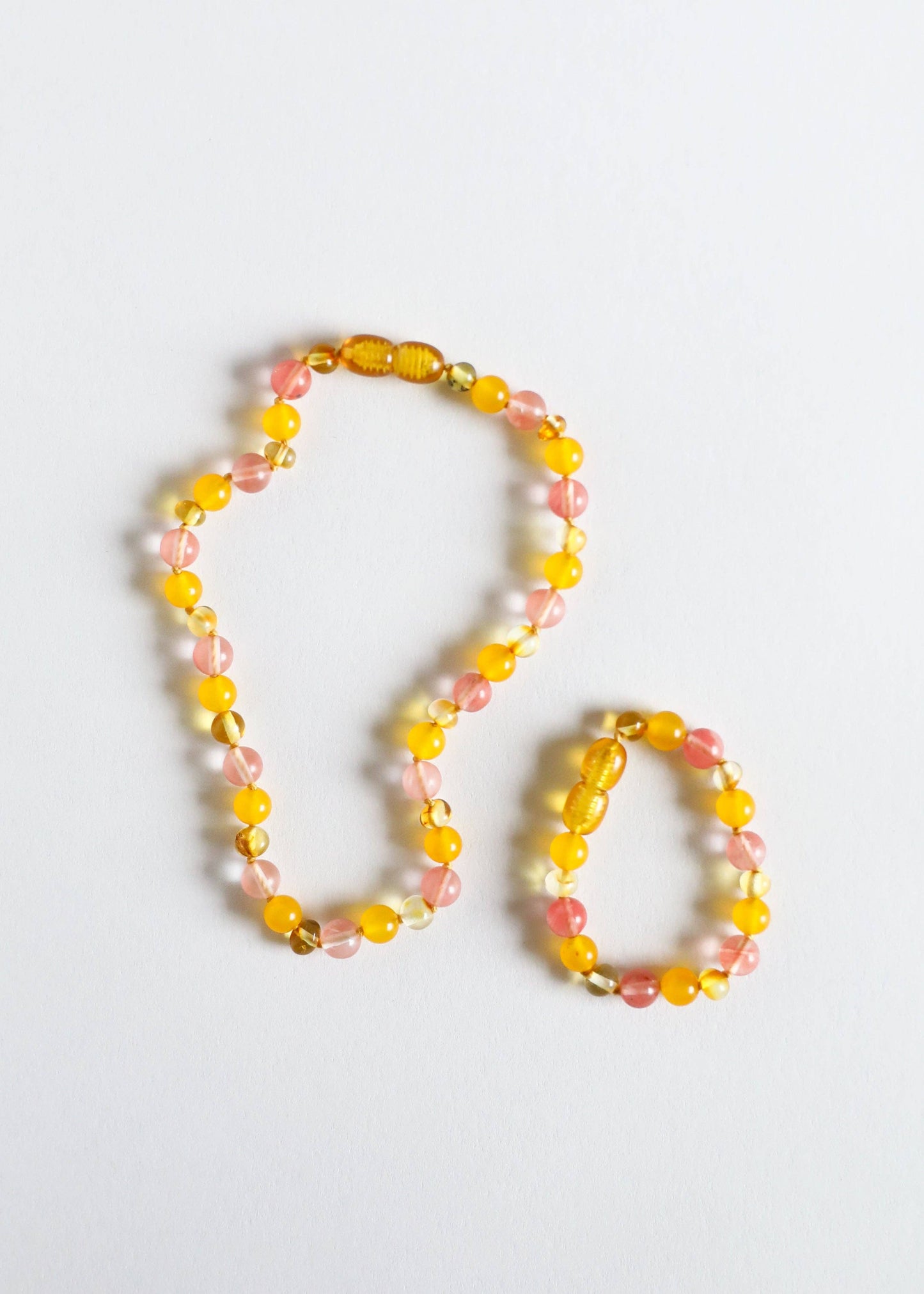 Baltic amber with rose quartz and Jade polished beaded child necklace.