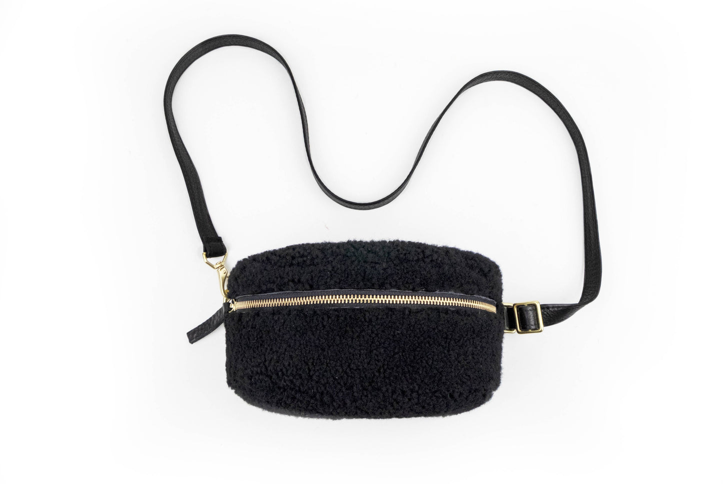 Sheepskin with a leather strap black bum bag.