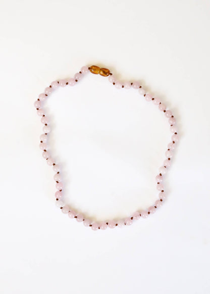 Child pure gemstone rose quartz necklace.