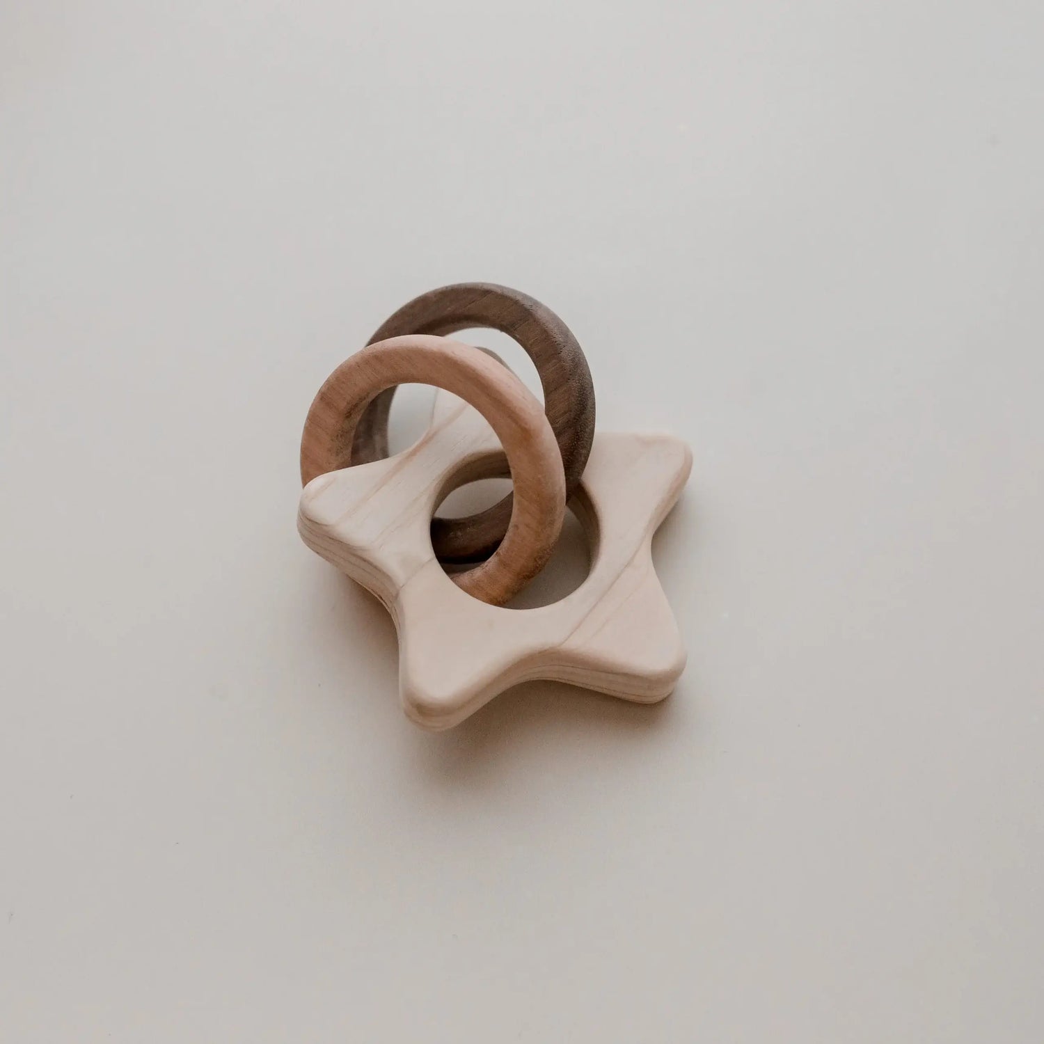 Wooden star-shaped Rattle for babies.