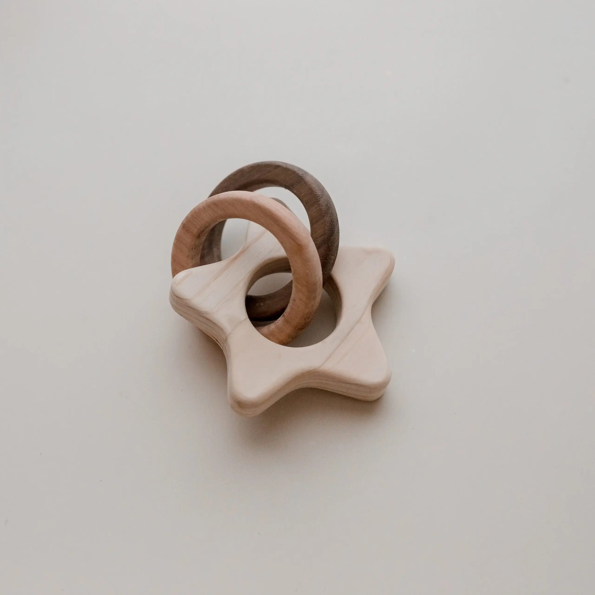 Wooden star-shaped Rattle for babies.