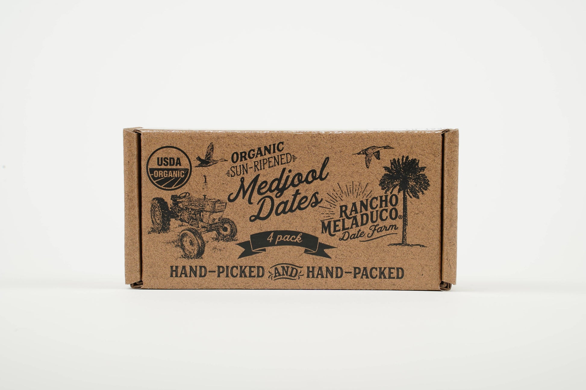 A box of Rancho Meladeco organic sun-dried dates.