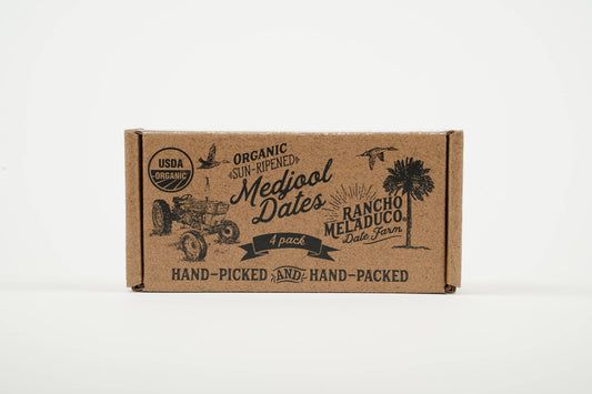 A box of Rancho Meladeco organic sun-dried dates.