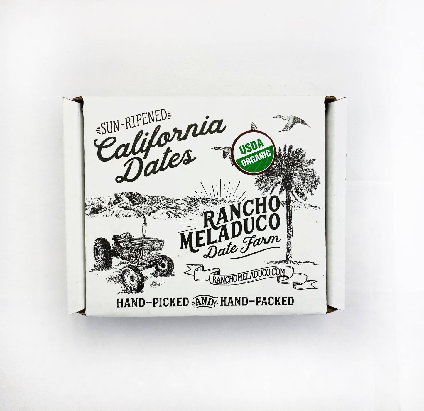 Box of Rancho Meladuco California dates with USDA Organic label.