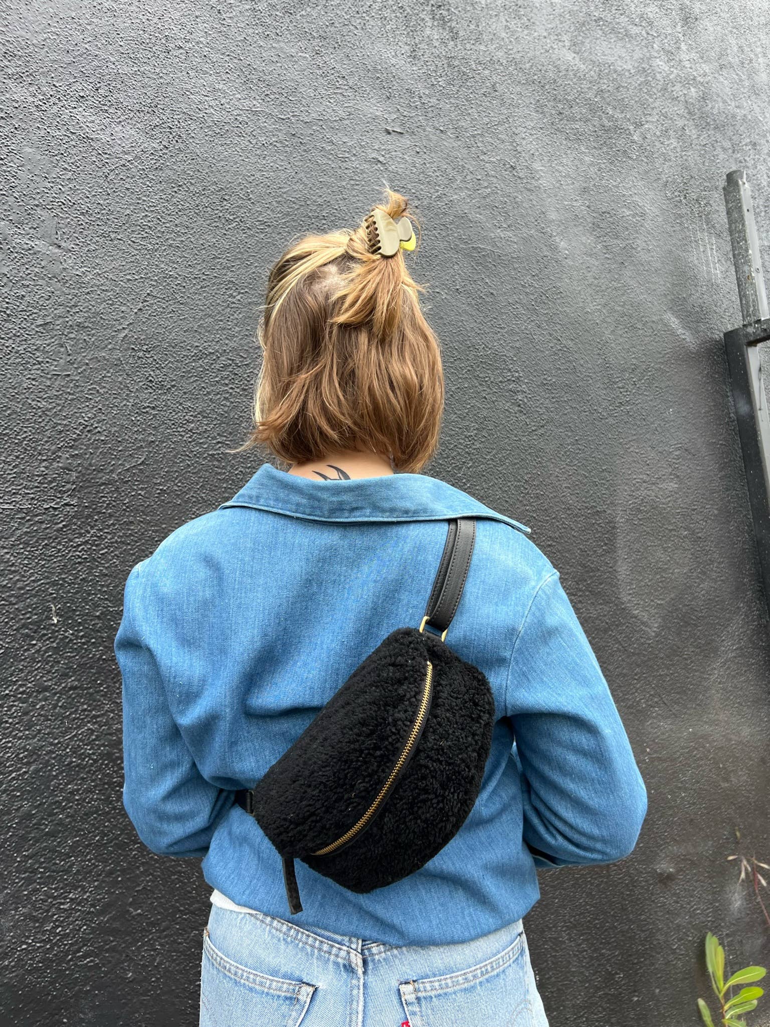 All-natural Sheepskin black bum bag.