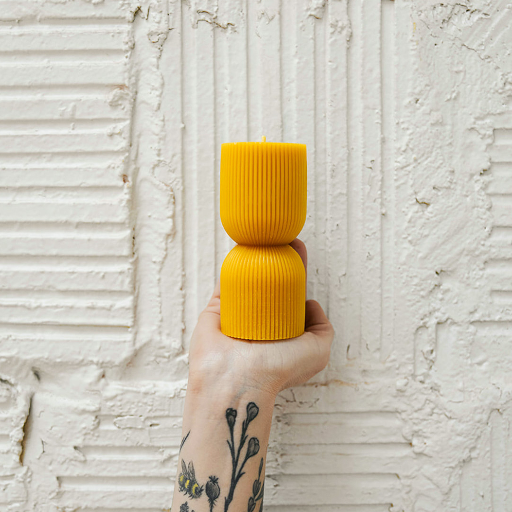 Stylish minimalist beeswax candle.